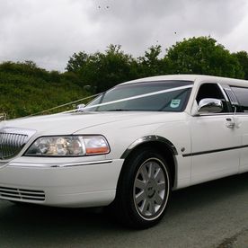 Our white limo ready for a wedding