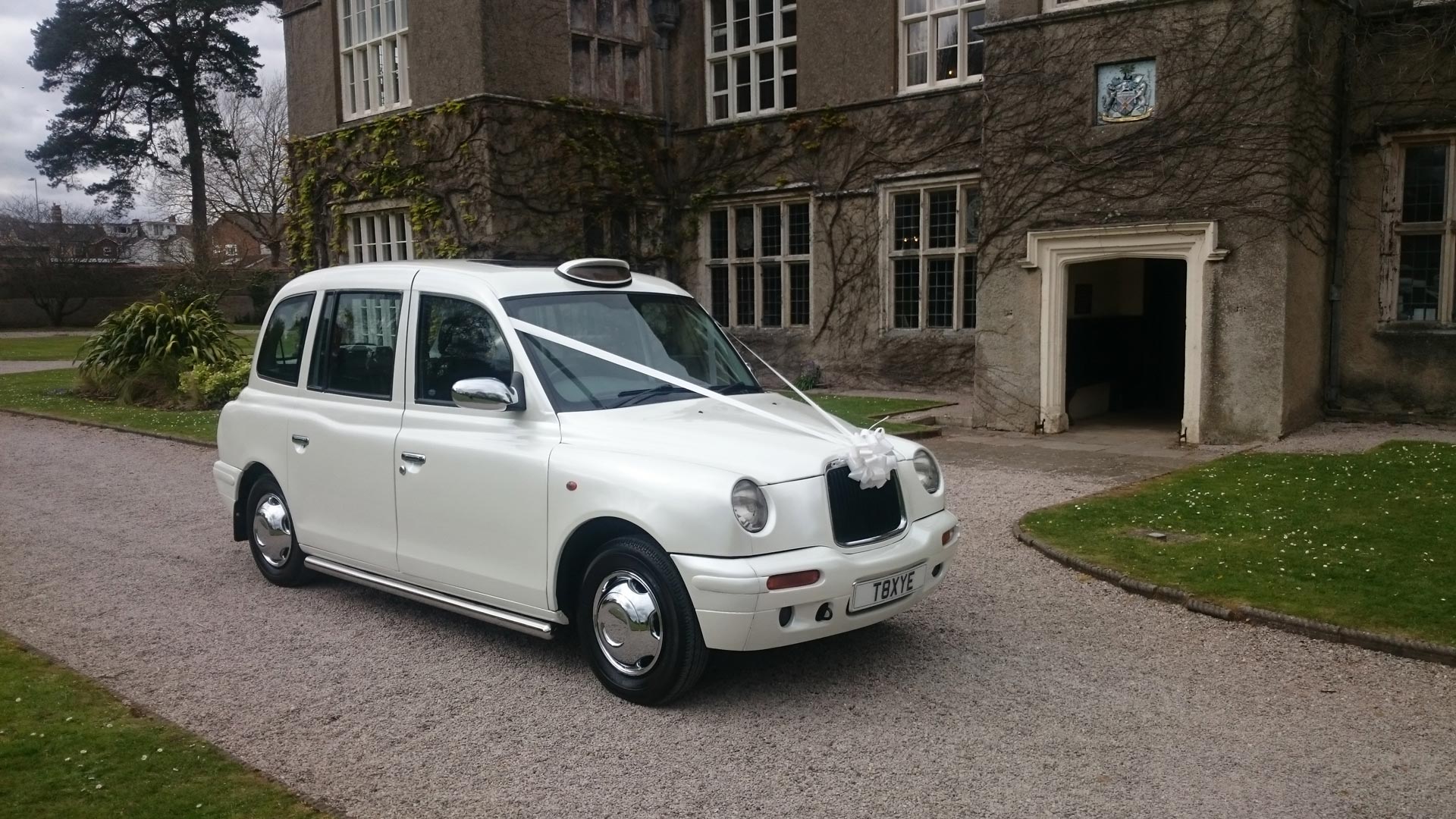 Our white London taxi used for weddings 